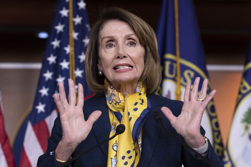 Speaker of the House Nancy Pelosi, D-Calif., talks to reporters a day after officially postponing President Donald Trump's State of the Union address until the government is fully reopened, at the Capitol in Washington, Thursday, Jan. 24, 2019. (AP Photo/J. Scott Applewhite) ** FILE **