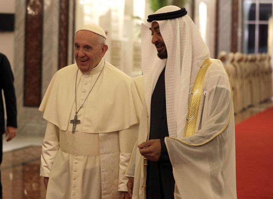 Pope Francis is welcomed by Abu Dhabi's Crown Prince Sheikh Mohammed bin Zayed Al Nahyan, upon his arrival at the Abu Dhabi airport, United Arab Emirates, Sunday, Feb. 3, 2019. Francis travelled to Abu Dhabi to participate in a conference on interreligious dialogue sponsored the Emirates-based Muslim Council of Elders, an initiative that seeks to counter religious fanaticism by promoting a moderate brand of Islam. (AP Photo/Andrew Medichini, Pool)