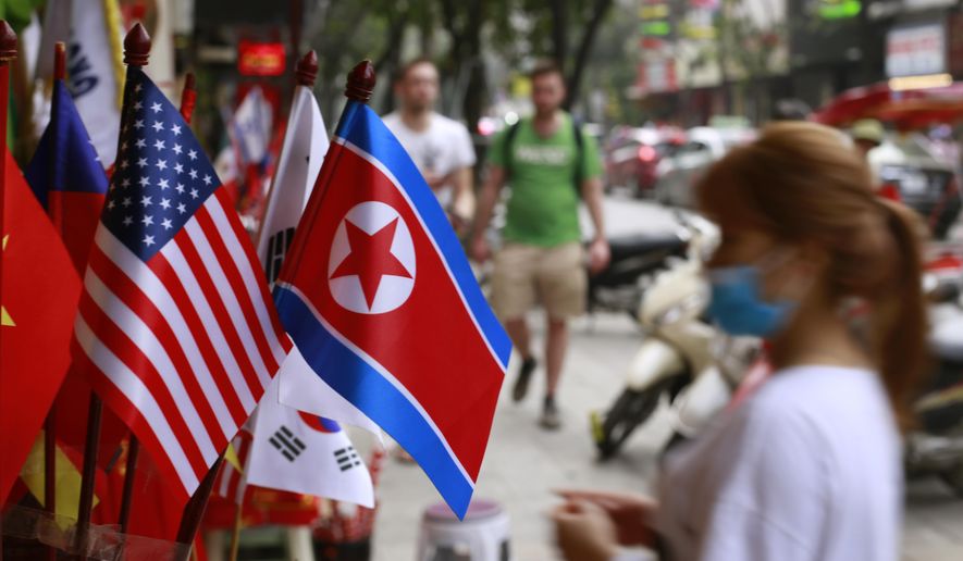 In this Jan. 29, 2019, photo, U.S and North Korean flags are on display for sale at a flag shop in Hanoi, Vietnam. Vietnam's selection as the venue for the second summit between U.S. President Donald Trump and North Korean leader Kim Jong Un is largely a matter of convenience and security, but not without bigger stakes. (AP Photo/Hau Dinh)