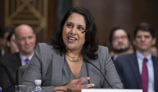 Neomi Rao, President Donald Trump&#39;s nominee for a seat on the D.C. Circuit Court of Appeals, appears before the Senate Judiciary Committee for her confirmation hearing, on Capitol Hill in Washington, Tuesday, Feb. 5, 2019. (AP Photo/J. Scott Applewhite) ** FILE **