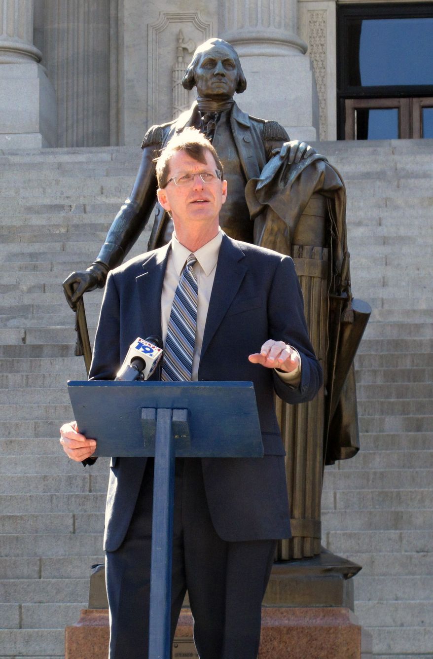 Republican U.S. Senate candidate Richard Cash speaks after signing an agreement to support any challenger who gets into a runoff with U.S. Sen. Lindsey Graham in June, on the steps of the Statehouse, Thursday, March 13, 2014, in Columbia, S.C. Six GOP candidates have said they want to take on Graham as he seeks a third term. (AP Photo/Jeffrey Collins)