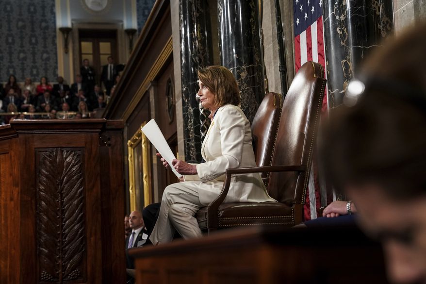 President Donald Trump gives his State of the Union address to a joint session of Congress, Tuesday, Feb. 5, 2019 at the Capitol in Washington, as Vice President Mike Pence, left, and House Speaker Nancy Pelosi look on. (Doug Mills/The New York Times via AP, Pool)