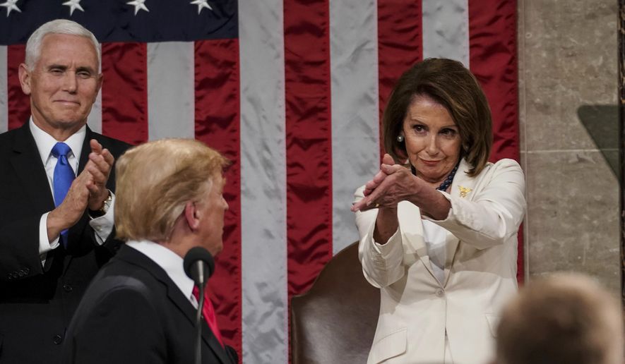President Donald Trump turns to House speaker Nancy Pelosi of Calif., as he delivers his State of the Union address to a joint session of Congress on Capitol Hill in Washington, as Vice President Mike Pence watches, Tuesday, Feb. 5, 2019.   (Doug Mills/The New York Times via AP, Pool) **FILE**