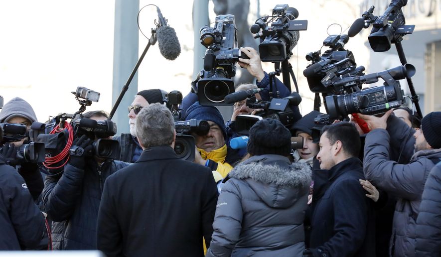 Jeffrey Lichtman, foreground left, a defense attorney for Joaquin "El Chapo" Guzman, arrives at federal court, in New York, Wednesday, Feb. 6, 2019. A jury is deliberating at the U.S. trial of the infamous Mexican drug lord. (AP Photo/Richard Drew)