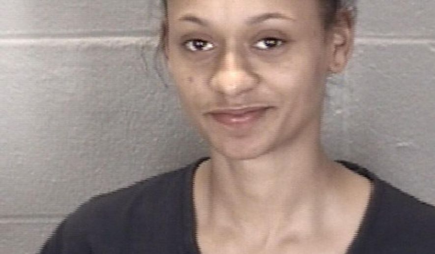 This undated booking photo released by Tippercanoe County Sheriff's Office shows Kiana Champagne Fletcher. The northwestern Indiana woman who barked at a police dog attracted the attention of officers, who arrested her on outstanding warrants. Lafayette police were conducting a traffic stop Monday, Feb. 4, 2019, when 20-year-old Fletcher began barking at a police dog sniffing the car that had been pulled over. Officers recognized Fletcher and knew she had two outstanding warrants. Police reports say Fletcher ran inside her house, but officers arrested her after obtaining a search warrant. (Tippercanoe County Sheriff's Office via AP)