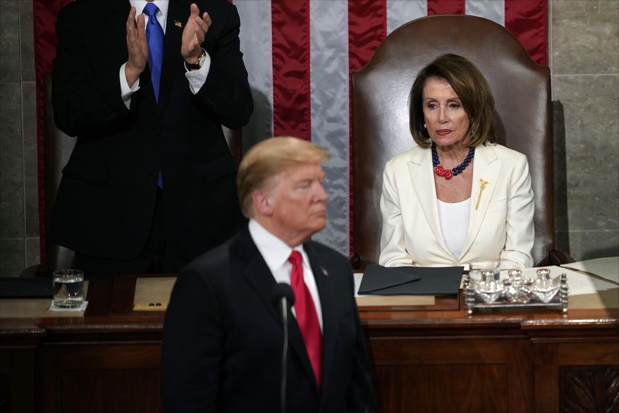 President Donald Trump delivers his State of the Union address to a joint session of Congress on Capitol Hill in Washington, as Vice President Mike Pence and Speaker of the House Nancy Pelosi, D-Calif., watch, Tuesday, Feb. 5, 2019. (AP Photo/Carolyn Kaster)