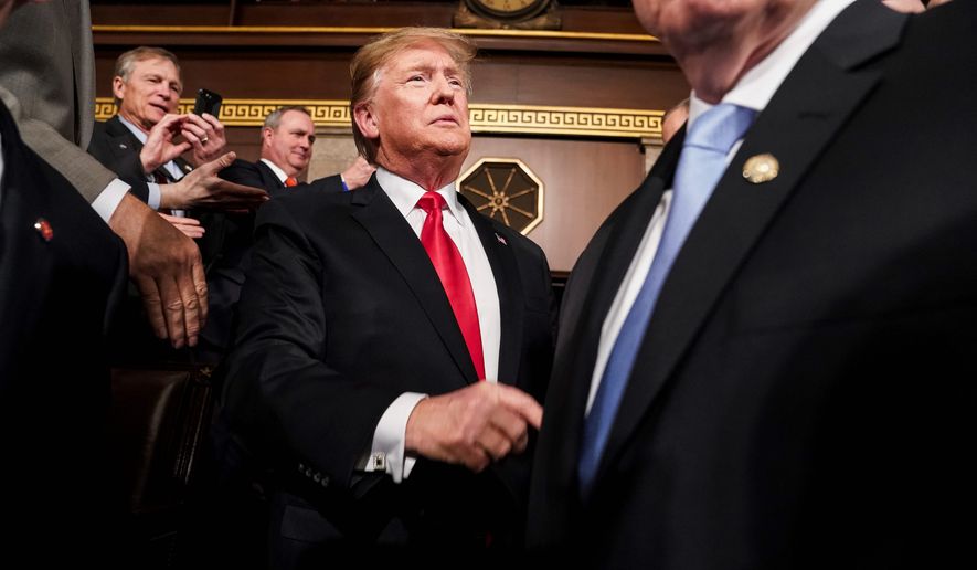 President Donald Trump arrives in the House chamber before giving his State of the Union address to a joint session of Congress, Tuesday, Feb. 5, 2019 at the Capitol in Washington. (Doug Mills/The New York Times via AP, Pool)