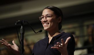 Democrat Alexandria Ocasio-Cortez, who won her bid for a seat in the House of Representatives in New York&#39;s 14th Congressional District, at the Kennedy School&#39;s Institute of Politics at Harvard University, Thursday, Dec. 6, 2018. (AP Photo/Charles Krupa)