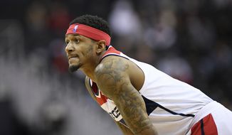 Washington Wizards guard Bradley Beal (3) stands on the court during the first half of an NBA basketball game against the Atlanta Hawks, Monday, Feb. 4, 2019, in Washington. (AP Photo/Nick Wass)