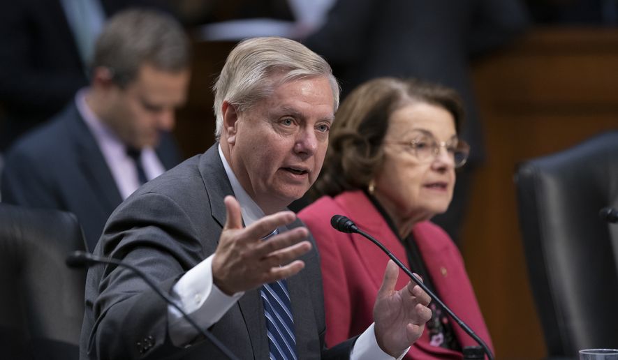 Senate Judiciary Committee Chairman Lindsey Graham, R-S.C., left, is joined by Sen. Dianne Feinstein, D-Calif., the ranking member, during a meeting to advance the nomination of Bill Barr to be attorney general, on Capitol Hill in Washington, Thursday, Feb. 7, 2019. (AP Photo/J. Scott Applewhite) ** FILE **