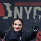 In this Jan. 19, 2019, file photo, U.S. Rep. Alexandria Ocasio-Cortez, (D-New York) waves to the crowd after speaking at Women&#39;s Unity Rally in Lower Manhattan in New York. Democrats including Ocasio-Cortez of New York and veteran Sen. Ed Markey of Mass. are calling for a Green New Deal intended to transform the U.S. economy to combat climate change and create jobs in renewable energy. (AP Photo/Kathy Willens, File) **FILE**
