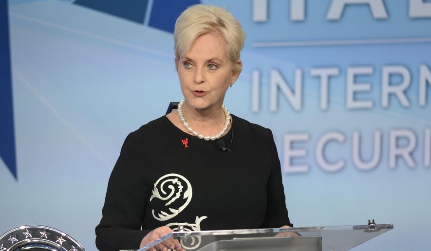 In this Nov. 17, 2018, file photo, Cindy McCain pauses while presenting the inaugural John McCain Prize for Leadership in Public Service to the People of the island of Lesbos, Greece, at the Halifax International Security Forum in Halifax, Canada. (Darren Calabrese/The Canadian Press via AP)