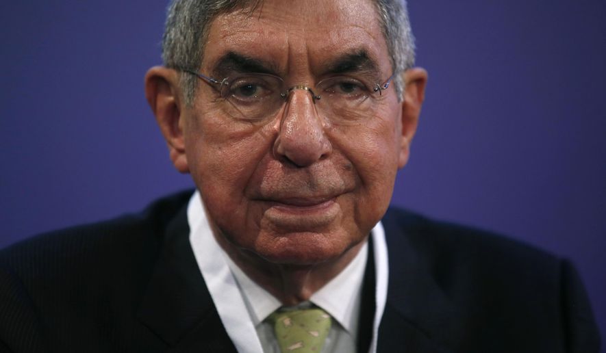 FILE - In this Nov. 13, 2015 file photo, Costa Rican 1987 Nobel peace laureate and former president of Costa Rica, Oscar Arias, looks at the media during the opening ceremony of the XV World Summit of Nobel Peace Laureates at the University in Barcelona, Spain. Arias has been accused of sexual assault by a nuclear disarmament activist, a charge he denies. She filed a criminal complaint on Monday, Feb. 4, 2019. (AP Photo/Manu Fernandez, File)