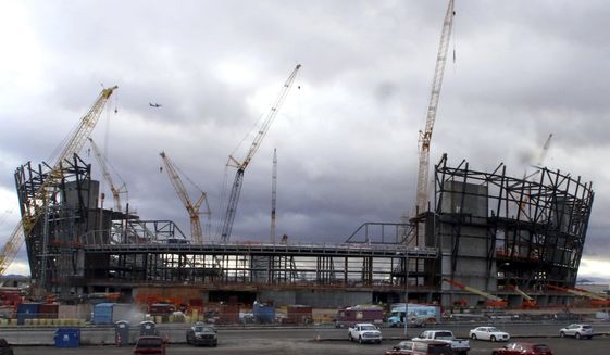 This Jan. 17, 2019, photo shows the construction site for the future Raiders stadium in Las Vegas. In 2018, 10 companies began efforts to leave Nevada&#x27;s utility monopoly, NV Energy. Others are still under construction, such as the Raiders&#x27; Las Vegas stadium and the MSG Sphere Las Vegas music and entertainment venue. (Bizuayehu Tesfaye/Las Vegas Review-Journal via AP)