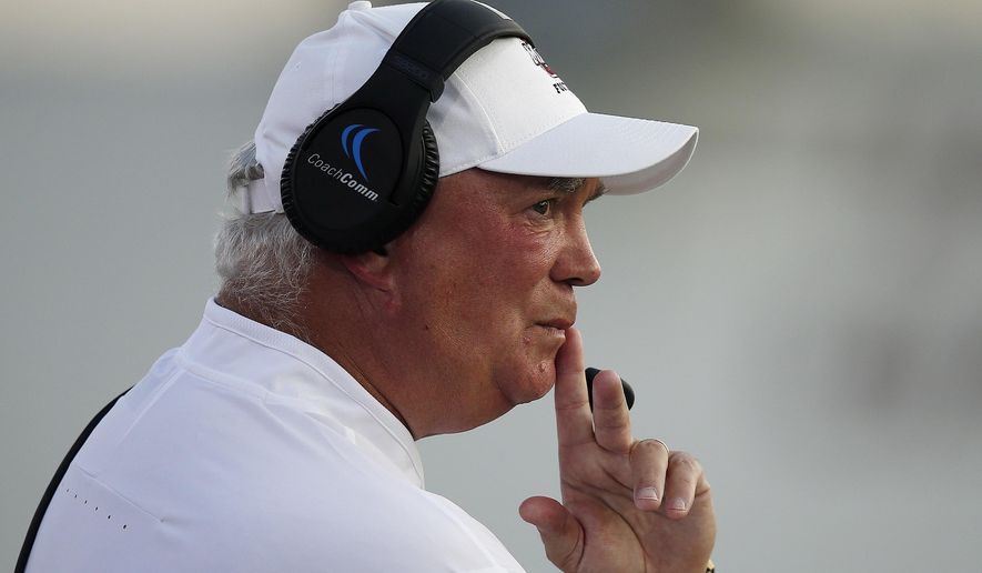 FILE - In this Aug. 25, 2018, file photo, Massachusetts coach Mark Whipple watches from the sideline during the first half of the team's NCAA college football game against Duquesne in Amherst, Mass. Pittsburgh coach Pat Narduzzi’s biggest coup during the offseason might be the 61-year-old passing game guru with a reputation as a quarterback whisperer. (AP Photo/Michael Dwyer, File)