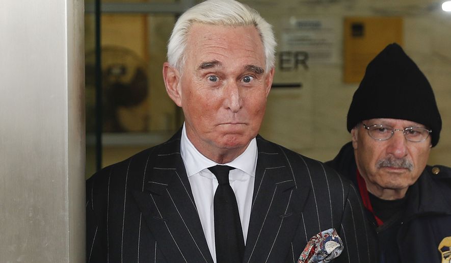 In this Feb. 1, 2019 file photo, former campaign adviser for President Donald Trump, Roger Stone, leaves federal court in Washington.  (AP Photo/Pablo Martinez Monsivais)