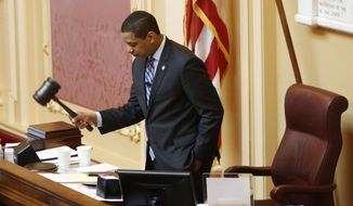 Virginia Lt. Gov. Justin Fairfax, gavels the session to order at the start of the Senate session at the Capitol in Richmond, Va., Friday, Feb. 8, 2019. (AP Photo/Steve Helber)