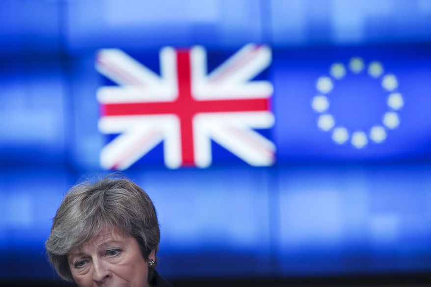 Britain's Prime Minister Theresa May talks to journalists after her meeting with European Council President Donald Tusk at the European Council headquarters in Brussels, Thursday, Feb. 7, 2019. (AP Photo/Francisco Seco)