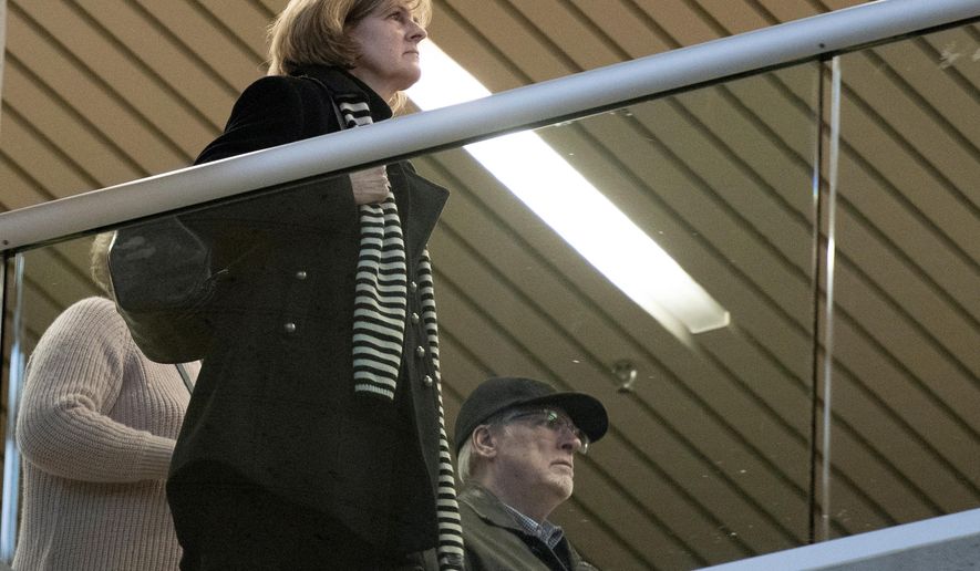 Manon Marchand and Raymond Bissonnette walk out after hearing the judge's sentencing for their son, Alexandre Bissonnette, Friday, Feb. 8, 2019, at the courthouse in Quebec City. Bissonnette, who shot dead six Muslim men in a Quebec City mosque in 2017 was sentenced to serve 40 years in prison before being eligible for parole.(Jacques Boissinot/The Canadian Press via AP)