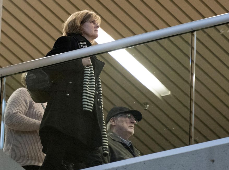 Manon Marchand and Raymond Bissonnette walk out after hearing the judge's sentencing for their son, Alexandre Bissonnette, Friday, Feb. 8, 2019, at the courthouse in Quebec City. Bissonnette, who shot dead six Muslim men in a Quebec City mosque in 2017 was sentenced to serve 40 years in prison before being eligible for parole.(Jacques Boissinot/The Canadian Press via AP)