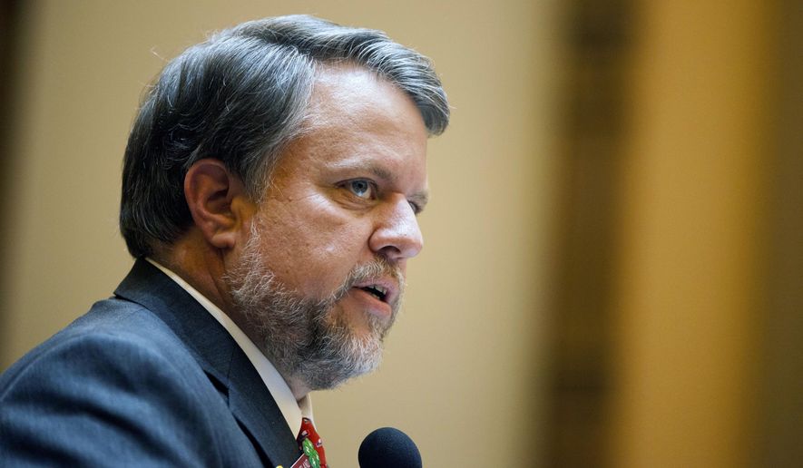 FILE- In this March 28, 2013 file photo, Georgia Rep. Terry England, speaks on the House floor in Atlanta. The Georgia House has approved a mid-year budget that increases funding for school safety and farmers hit by Hurricane Michael. England said the budget passed Friday, Feb. 8, 2019 comes after continued revenue growth. (AP Photo/David Goldman, File)