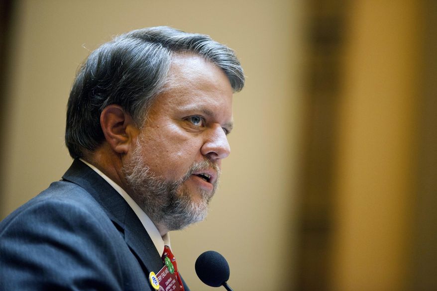 FILE- In this March 28, 2013 file photo, Georgia Rep. Terry England, speaks on the House floor in Atlanta. The Georgia House has approved a mid-year budget that increases funding for school safety and farmers hit by Hurricane Michael. England said the budget passed Friday, Feb. 8, 2019 comes after continued revenue growth. (AP Photo/David Goldman, File)