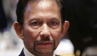 In this Oct. 18, 2018, file photo, Brunei&#39;s Sultan Hassanal Bolkiah attends a round table meeting at the ASEM 12 in Brussels. Southeast Asia’s smallest nation is an absolute monarchy ruled by the wealthy, autocratic Sultan Hassanal Bolkiah, who is also prime minister, defense minister and finance minister. He has ruled through emergency decree since 1984 and the country’s last election was in 1962. (AP Photo/Francisco Seco, File)