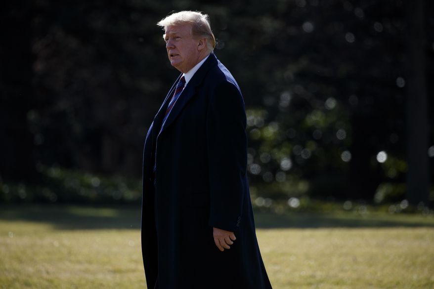 President Donald Trump walks to board Marine One for a trip to Walter Reed National Military Medical Center to attend his annual physical, Friday, Feb. 8, 2019, in Washington. (AP Photo/ Evan Vucci)