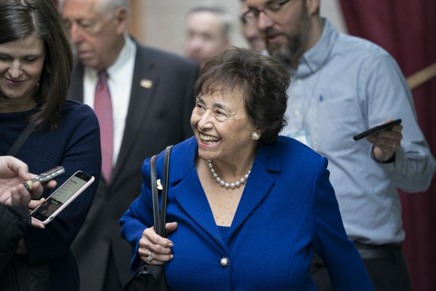 In this Feb. 6, 2019, photo House Appropriations Committee Chair Nita Lowey, D-N.Y., head of the bipartisan group of House and Senate bargainers trying to negotiate a border security compromise in hope of avoiding another government shutdown, walks with reporters to a Democratic Caucus on Capitol Hill in Washington. Congressional bargainers seem close to clinching a border security agreement that would avert a fresh government shutdown, with leaders of both parties voicing optimism and the top GOP negotiator saying he believes President Donald Trump would back the emerging accord. (AP Photo/J. Scott Applewhite)