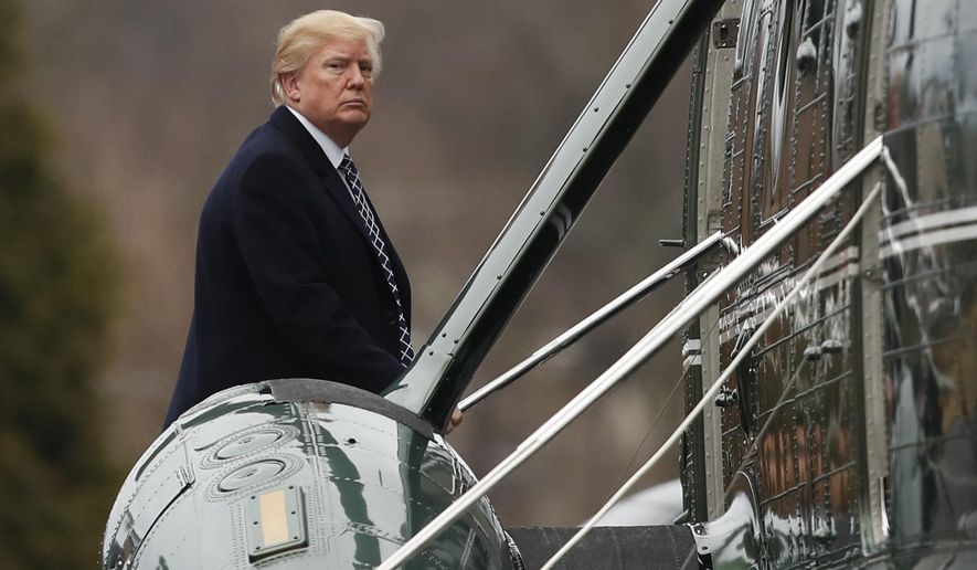 FILE - In this Jan. 12, 2018, file photo, President Donald Trump boards Marine One as he leaves Walter Reed National Military Medical Center in Bethesda, Md., after his first medical check-up as president. Trump is in for some poking and prodding as doctors assess whether his “incredibly good genes” continue to serve him well. Trump travels to Walter Reed National Military Medical Center outside Washington on Friday, Feb. 8, 2019, for his second annual medical checkup as president.(AP Photo/Carolyn Kaster, File)