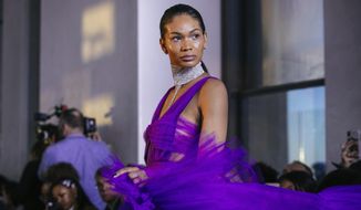 The latest fashion creation from Christian Siriano is modeled during New York Fashion Week, Saturday, Feb. 9, 2019, in New York. (AP Photo/Kevin Hagen)