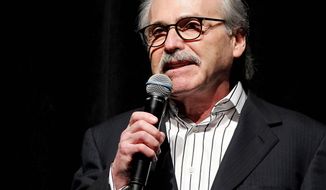 In this Jan. 31, 2014, photo, David Pecker, Chairman and CEO of American Media, addresses those attending the Shape &amp;amp; Men&#39;s Fitness Super Bowl Party in New York. An attorney for the head of the National Enquirer’s parent company says the tabloid didn’t commit extortion or blackmail by threatening to publish Amazon CEO Jeff Bezos’ explicit photos. Elkan Abramowitz represents American Media Inc. CEO David Pecker. He defended the tabloid’s practice as a “negotiation” in an interview Sunday, Feb. 10, 2019, with ABC News. (Marion Curtis via AP) **FILE**