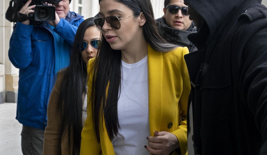 Emma Coronel Aispuro, center, wife of Joaquin "El Chapo" Guzman, arrives at federal court, Monday, Feb. 11, 2019, in New York. A jury is deliberating at the U.S. trial of the infamous Mexican drug lord. (AP Photo/Craig Ruttle)