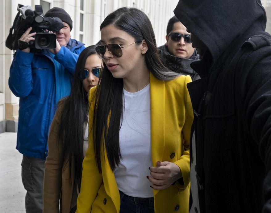 Emma Coronel Aispuro, center, wife of Joaquin "El Chapo" Guzman, arrives at federal court, Monday, Feb. 11, 2019, in New York. A jury is deliberating at the U.S. trial of the infamous Mexican drug lord. (AP Photo/Craig Ruttle)