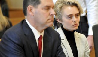 Michelle Carter, 22, appears in Taunton District Court in Taunton, Mass. Monday, February 11, 2019 for a hearing on her prison sentence. Carter was convicted in 2017 of involuntary manslaughter and sentenced to a 15 month prison term for encouraging 18-year-old Conrad Roy, III to kill himself when she instructed him over the phone to get back in his truck that was filling with toxic gas in July 2014. Her sentence was put on hold while the court reviewed the case and the defense argument that her actions were not criminal. Her conviction was upheld. Carter was jailed Monday on an involuntary manslaughter conviction.  (Mark Stockwell/The Sun Chronicle via AP, Pool)