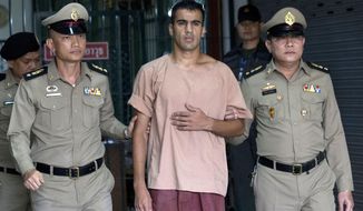 FILE - In this Monday, Feb. 4, 2019, file photo, refugee soccer player Bahraini Hakeem al-Araibi leaves the criminal court in Bangkok, Thailand. A Thai court on Monday, Feb. 11, 2019, has ordered the release of al-Araibi after prosecutors said they were no longer seeking his extradition to Bahrain. (AP Photo/Sakchai Lalit, File)