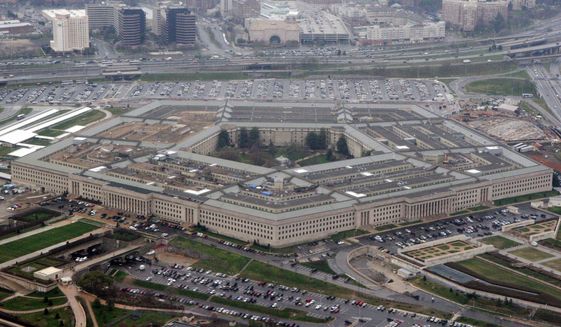 This March 27, 2008, file aerial photo shows the Pentagon in Washington.  (AP Photo/Charles Dharapak, File)