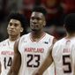 Maryland forward Bruno Fernando, of Angola, (23) walks past teammates Ricky Lindo Jr., back left, and Eric Ayala in the first half of an NCAA college basketball game against Purdue, Tuesday, Feb. 12, 2019, in College Park, Md. (AP Photo/Patrick Semansky) ** FILE **