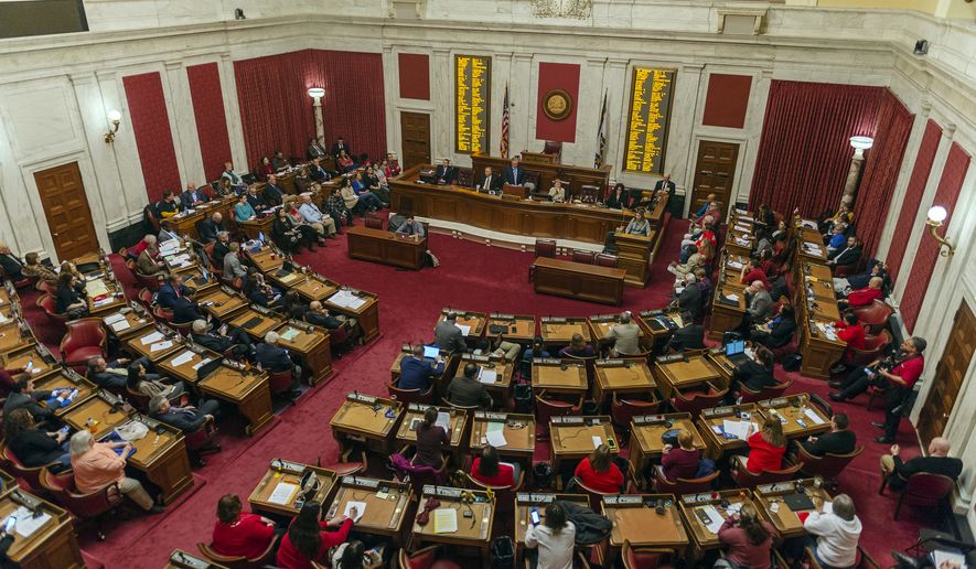 In this Monday, Feb. 11, 2019, photo, delegates, teachers and school personnel attend a public hearing on education in the House of Delegates chamber in Charleston, W.Va. (Craig Hudson/Charleston Gazette-Mail via AP)