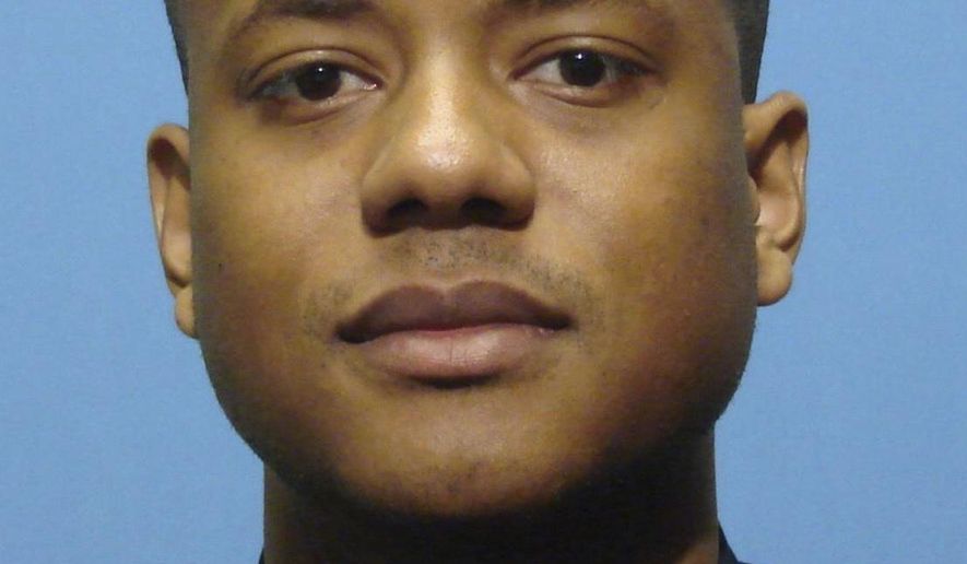 FILE - This undated file photo provided by the Baltimore Police Department shows Jemell Rayam. Rayam, a disgraced Baltimore police detective who led a double life as a drug gang collaborator, has been sentenced to 10 years in federal prison for his role on an out-of-control unit of city officers who resold looted narcotics, conducted brazen robberies, and falsified evidence. (Baltimore Police Department via AP, File)