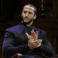 FILE - In this Oct. 11, 2018, file photo, former NFL football quarterback Colin Kaepernick applauds while seated on stage during W.E.B. Du Bois Medal ceremonies at Harvard University in Cambridge, Mass. Republican concerns that the former NFL quarterback is too controversial to honor as a black leader doomed a resolution recognizing Black History Month in the state Assembly, Tuesday, Feb. 12, 2019. The Legislature&#39;s black caucus had proposed a resolution honoring a number of black leaders, including Kaepernick, but Assembly Republicans refused to take it up. (AP Photo/Steven Senne, File)