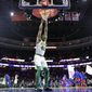 Boston Celtics&#39; Al Horford stretches before an NBA basketball game against the Philadelphia 76ers, Tuesday, Feb. 12, 2019, in Philadelphia. (AP Photo/Matt Slocum)