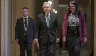 Senate Majority Leader Mitch McConnell, R-Ky., walks to the chamber on the morning after House and Senate negotiators worked out a border security compromise hoping to avoid another government shutdown, at the Capitol in in Washington, Tuesday, Feb. 12, 2019. (AP Photo/J. Scott Applewhite)