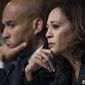 In this Sept. 27, 2018, file photo, Sen. Cory Booker, D-N.J., and Sen. Kamala Harris, D-Calif., listen as Dr. Christine Blasey Ford testifies during the Senate Judiciary Committee hearing on the nomination of Brett M. Kavanaugh to be an associate justice of the Supreme Court of the United States, focusing on allegations of sexual assault by Kavanaugh against Christine Blasey Ford in the early 1980s. (Tom Williams/Pool Photo via AP)