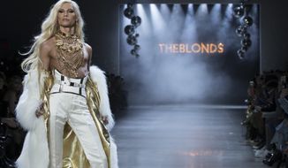 Designer Phillipe Blond walks the runway during The Blonds collection presentation during New York Fashion Week, Tuesday, Feb. 12, 2019. (AP Photo/Mary Altaffer)