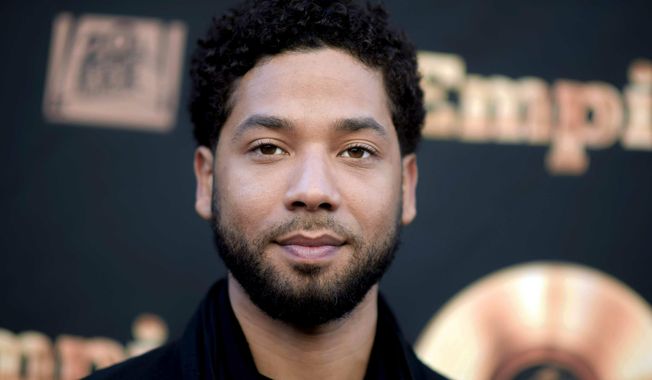 In this May 20, 2016, photo, actor and singer Jussie Smollett attends the &amp;quot;Empire&amp;quot; FYC Event in Los Angeles. Chicago police say they&#x27;re interviewing two &amp;quot;persons of interest&amp;quot; who surveillance photos show were in the downtown area where Smollett says he was attacked last month. A police spokesman said Thursday the two men aren&#x27;t considered suspects but may have been in the area at the time Smollett says he was attacked. Smollett says two masked men shouted racial and homophobic slurs before beating him and putting a rope around his neck on Jan. 29. (Richard Shotwell/Invision/AP) **FILE**
