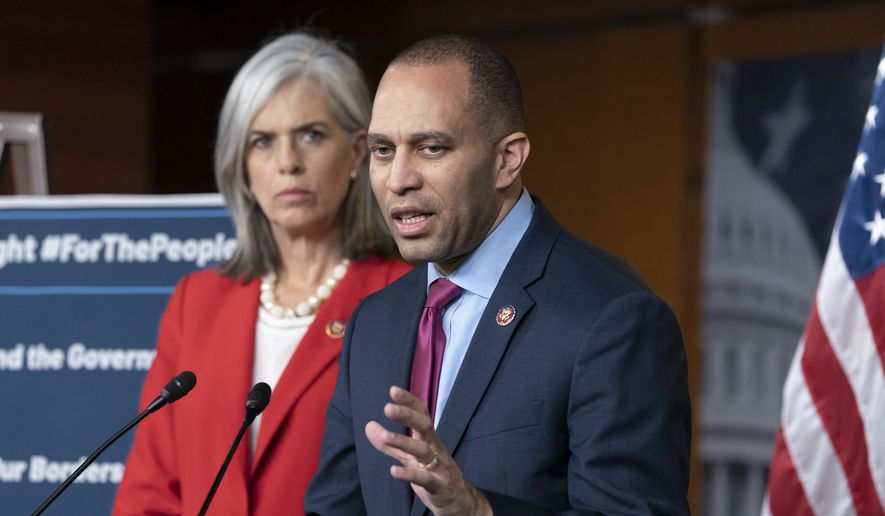 Rep. Hakeem Jeffries, D-N.Y., the Democratic Caucus chair, joined at left by Rep. Katherine M. Clark, D-Mass., left, Caucus vice chair, speaks with reporters at the Capitol in Washington, Wednesday, Feb. 13, 2019.  (AP Photo/J. Scott Applewhite)