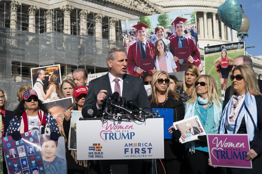 House Minority Leader Kevin McCarthy, R-Calif., joins supporters of President Donald Trump and family members of Americans killed by undocumented immigrants as they gather to to promote their support for a border wall with Mexico, at the Capitol in Washington, Wednesday, Feb. 13, 2019. (AP Photo/J. Scott Applewhite)