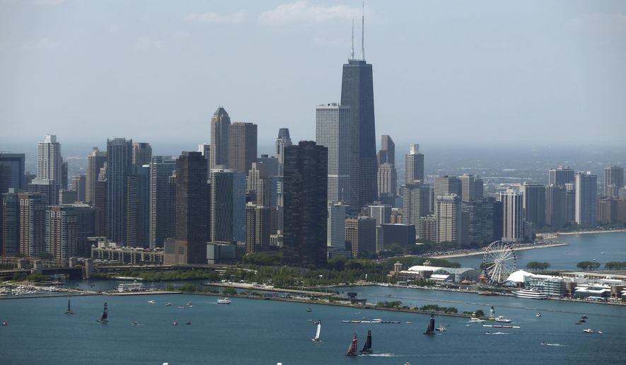 Sailboats practice in front of the downtown Chicago skyline during practice for an America&#39;s Cup World Series sailing event, June 10, 2016. (AP Photo/Kiichiro Sato) ** FILE **