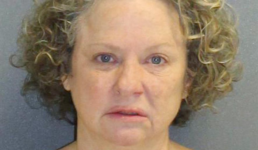 This Friday Feb. 8, 2019, booking photo made available by the Volusia County, Fla., Sheriff's Office, shows Julie Andrews, who was stopped by a deputy on suspicion of drunk driving. The deputy who is black said Andrews would have the Ku Klux Klan burn crosses on his property. The arrest report says Edwards smelled of alcohol, had slurred speech and was unsteady on her feet. (Volusia County Sheriff's Office via AP)